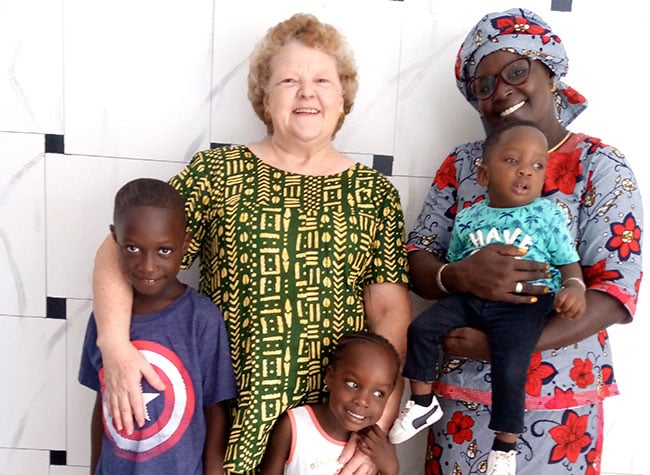 Second-career missionary Lori with her African family