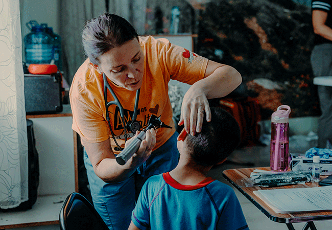 A missionary nurse uses her medical skills to serve the community on mission.